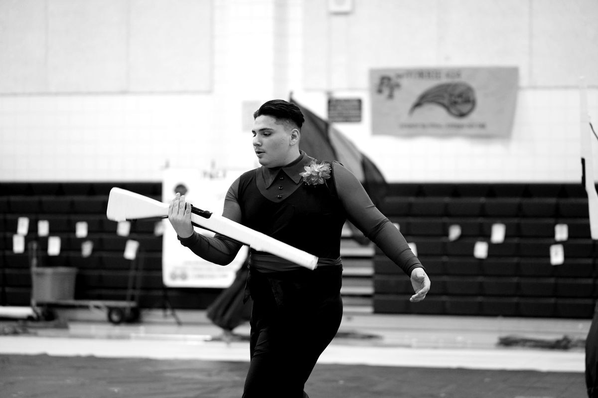 Morgan working a rifle toss during a competition run.